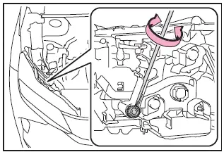 Subaru Solterra adjusting headlight bolt A with screwdriver vertical alignment control
