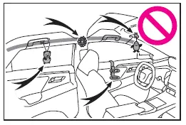 Subaru Solterra curtain airbag deployment area with warning about hanging objects